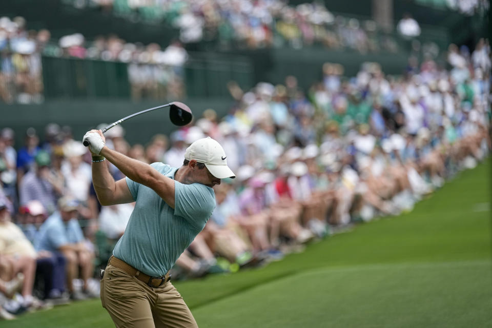 Rory McIlroy, of Northern Ireland, hits his tee shot on the 14th hole during the first round of the Masters golf tournament at Augusta National Golf Club on Thursday, April 6, 2023, in Augusta, Ga. (AP Photo/David J. Phillip)
