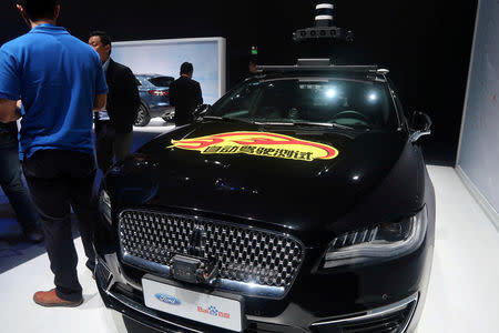FILE PHOTO: A Lincoln car with self-driving equipment developed by Ford and Baidu is seen at a product launching event in Shanghai, China April 3, 2019. REUTERS/Yilei Sun/File Photo