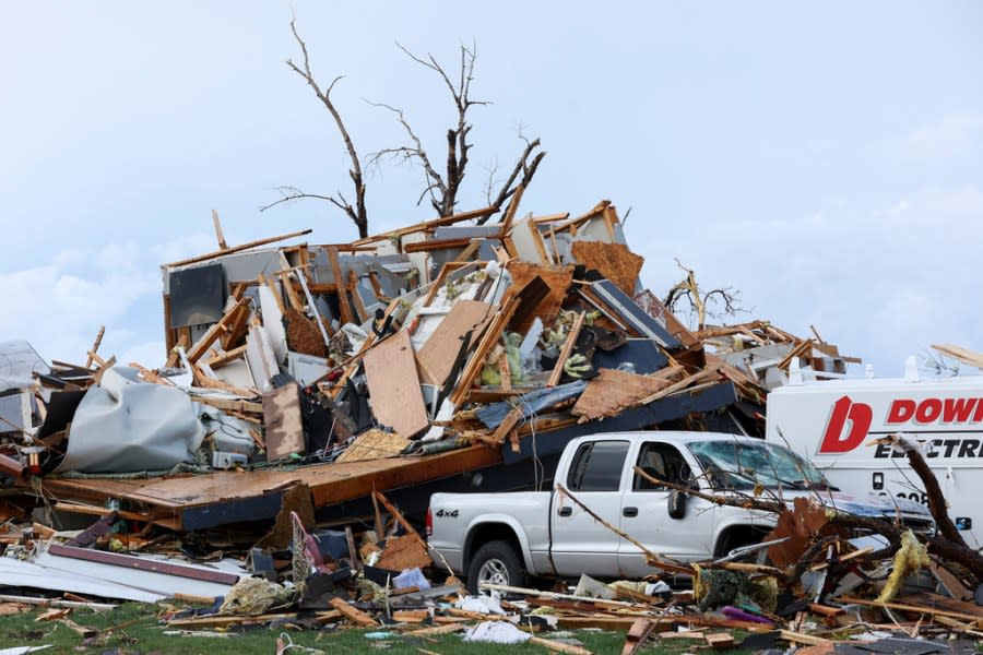 Damage is seen to home after it was leveled by a tornado near Omaha, Neb., on Friday, April 26, 2024. (Nikos Frazier/Omaha World-Herald via AP)