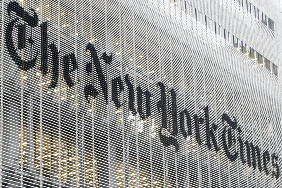 FILE - This Wednesday, Oct. 10, 2012 file photo shows the New York Times logo on the company's building in New York. On Friday, July 3, 2020, The Associated Press reported on a manipulated video image circulating online incorrectly asserting it shows a news story that The New York Times posted on June 27, then quickly pulled down, which claimed U.S. President Donald Trump died of a hydroxychloroquine overdose. The TikTok user who spread the rumor about the fake article posted an explanation confirming she shared it as a joke. “That video was entirely a joke and meant no harm,” she said. (AP Photo/Richard Drew)