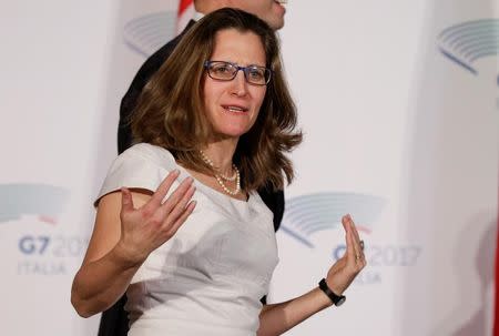 Canada's Foreign Affairs Minister Chrystia Freeland gestures as she arrives to pose for a family photo during a G7 for foreign ministers in Lucca, Italy April 11, 2017. REUTERS/Max Rossi