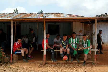 FARC members rest after a soccer match in Los Robles, Colombia, January 25, 2017. REUTERS/Federico Rios