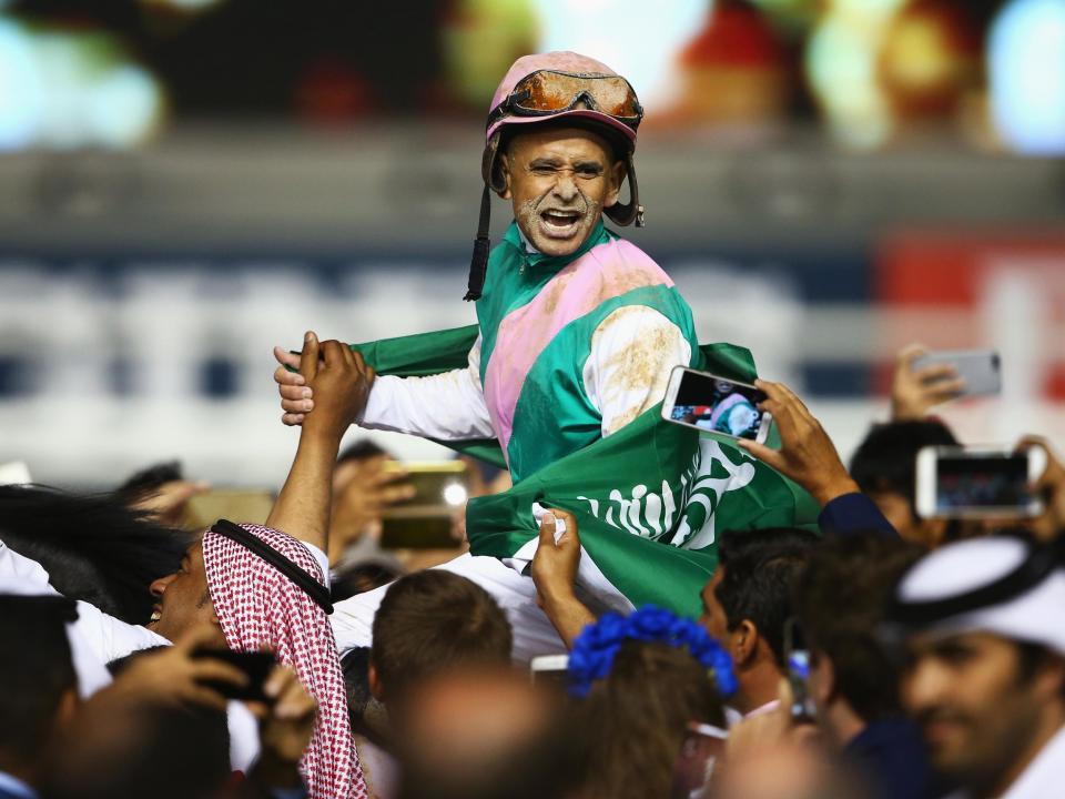 Mike Smith riding Arrogate celebrates winning the Dubai World Cup: Getty