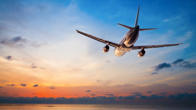 Plane flying over an ocean