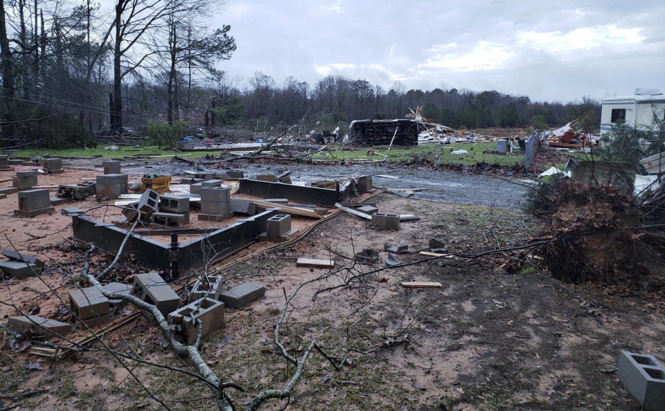 This photo provided by Bossier Parish Sheriff's Office shows damage from Friday nights severe weather in Bossier Parish, La., on Saturday, Jan. 11, 2020. Several people were killed in Louisiana, including an elderly couple found near their trailer home Saturday by firefighters. (Lt. Bill Davis/Bossier Parish Sheriff's Office via AP)