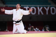 <p>Team Georgia's Lasha Bekauri soaks in his judo men's -90kg gold medal win against Germany's Eduard Trippel at the Nippon Budokan on July 28.</p>