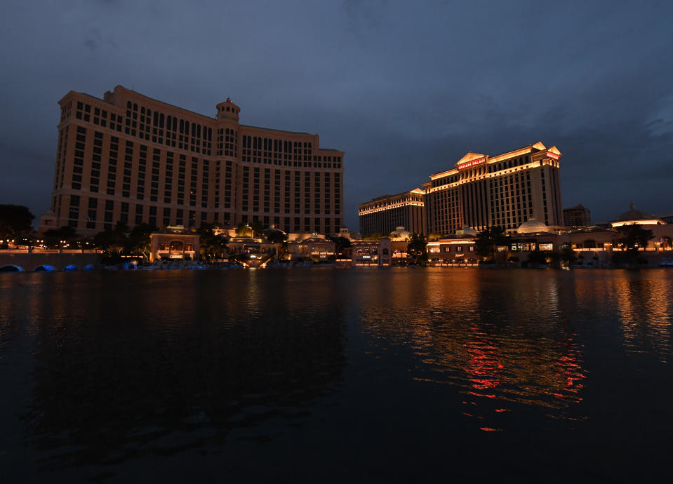 The Bellagio Resort & Casino, shown to the left of Caesars Palace, goes dark as a result of Nevada's statewide shutdown due to the coronavirus. The Bellagio was supposed to host the 2020 NFL draft in an elaborate setup. (Photo by Ethan Miller/Getty Images)