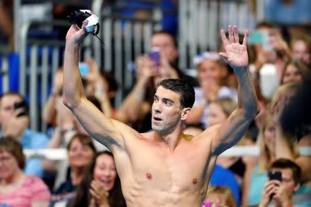 Jun 29, 2016; Omaha, NE, USA; Michael Phelps reacts after the finals for the men's 200 meter butterfly during the in the U.S. Olympic Swimming Team Trials at CenturyLink Center. Mandatory Credit: Rob Schumacher-USA TODAY Sports