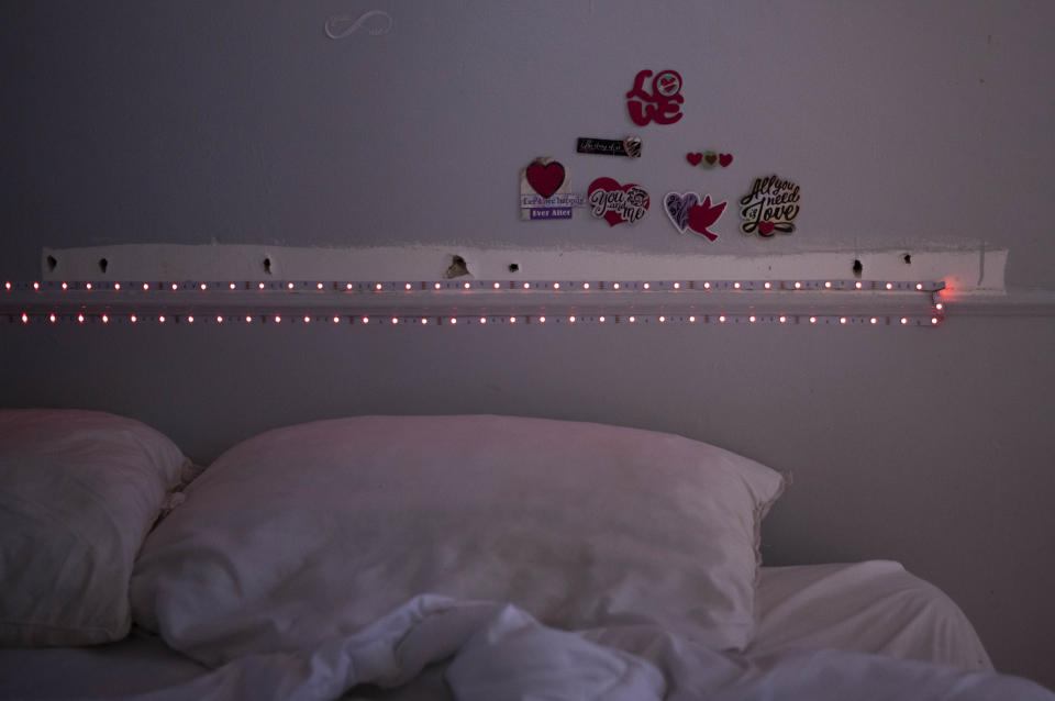 A motel room wall is adorned with heart-shaped ornaments by a homeless resident who recently moved into the property as part of the Los Angeles Mayor Karen Bass' Inside Safe initiative in Culver City, Calif., Tuesday, November 28, 2023. Out of nearly 2,000 people who received temporary shelter through Bass' signature program Inside Safe – a pilot project within City Hall's broader efforts to bring people indoors - only 255 landed in permanent housing this year, out of about 3,500 total citywide. (AP Photo/Jae C. Hong)