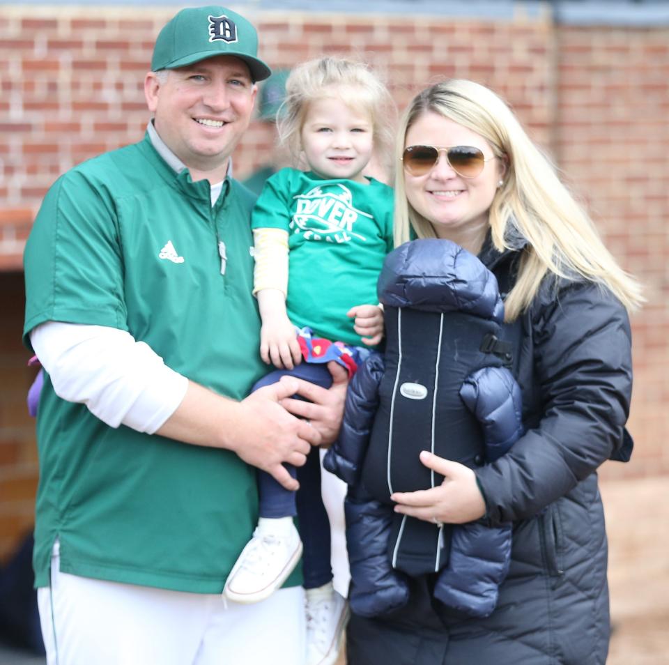 Dover head coach Scott Dubben poses with his wife, Shayna, and their two kids following Thursday's game against Concord at Doubleday Field.