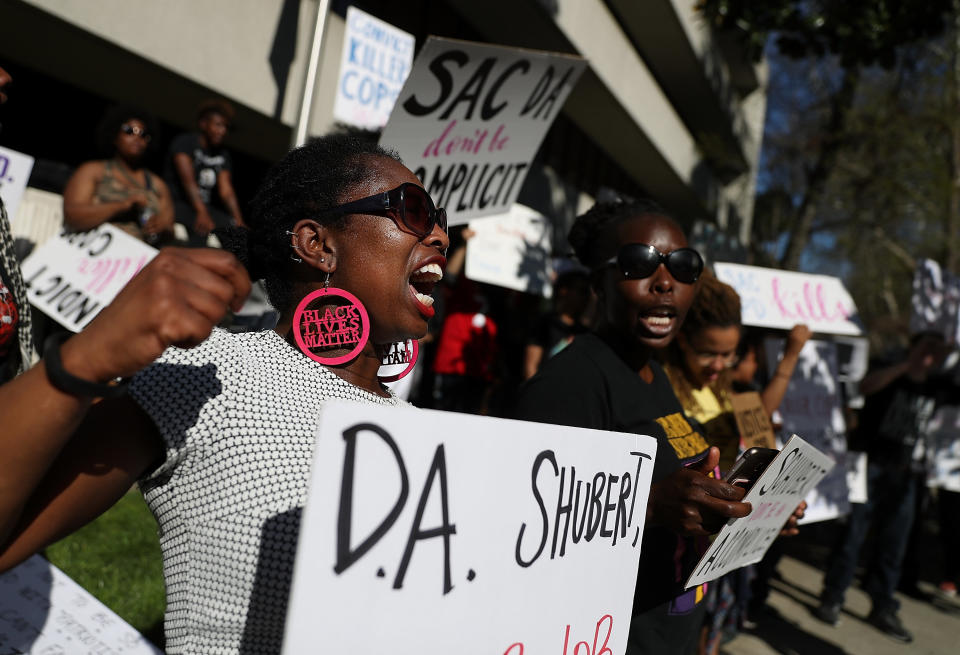 Black Lives Matter protesters stage a demonstration outside of office of District Attorney Anne Schubert on Wednesday in Sacramento. (Photo: Justin Sullivan via Getty Images)