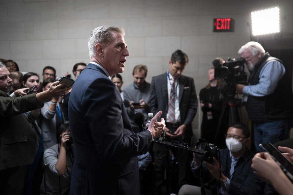 Former Speaker Kevin McCarthy, R-Calif., talks to reporters as House Republicans hold a closed-door forum to hear from the candidates for speaker of the House, at the Capitol in Washington, Tuesday, Oct. 10, 2023. House business and most congressional action has come to a standstill after Rep. Kevin McCarthy, R-Calif., was ousted as speaker by conservatives in his own party. (AP Photo/J. Scott Applewhite)