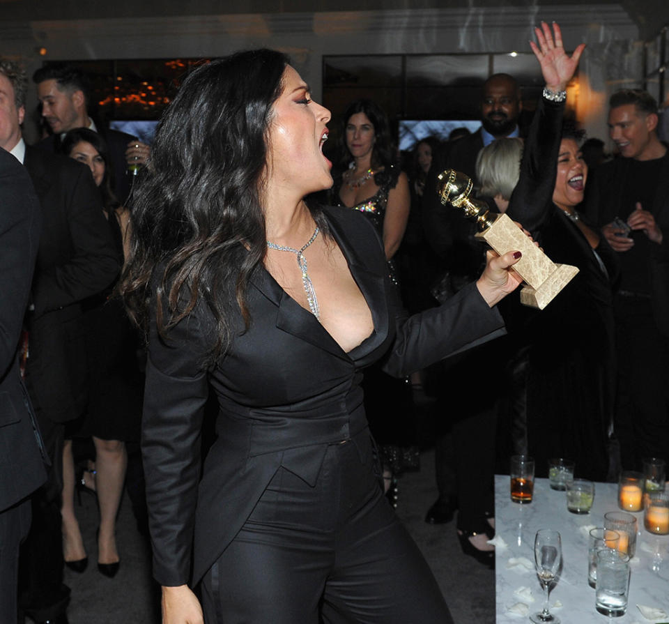 <p>Salma Hayek had some fun with a Golden Globe at the 2018 InStyle and Warner Bros. party. (Photo: Donato Sardella/Getty Images for InStyle ) </p>