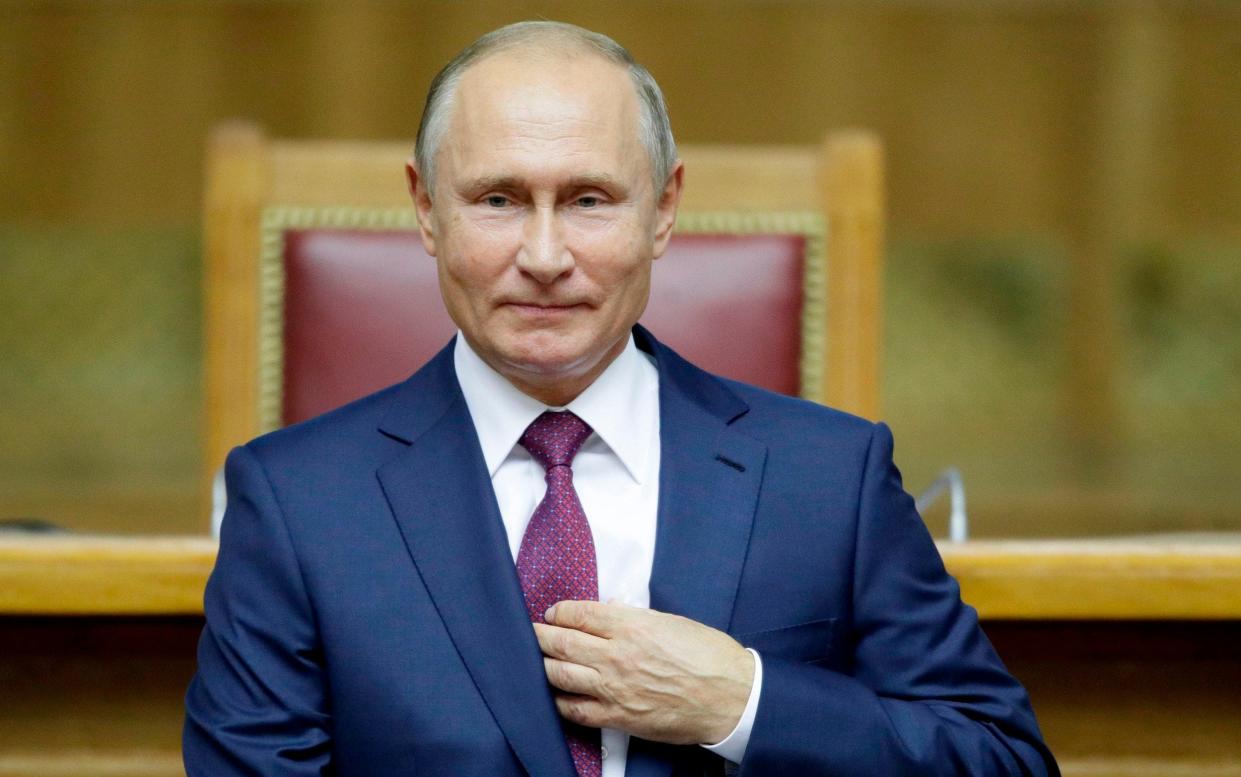 Russian President Vladimir Putin backed Andrei Tarasenko - AFP