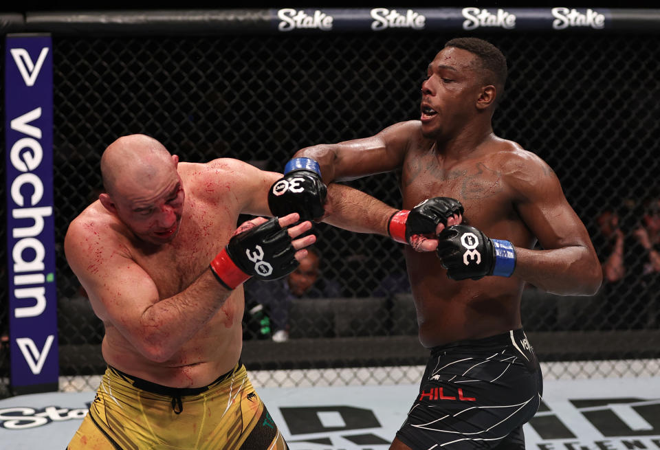 RIO DE JANEIRO, BRAZIL - JANUARY 21: (R-L) Jamahal Hill battles Glover Teixeira of Brazil in the UFC light heavyweight championship fight during the UFC 283 event at Jeunesse Arena on January 21, 2023 in Rio de Janeiro, Brazil. (Photo by Buda Mendes/Zuffa LLC via Getty Images)