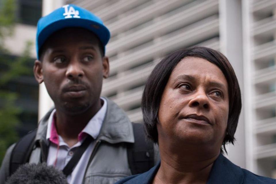 Doreen Lawrence, the mother of murdered teenager Stephen Lawrence, leaves the Home Office with her son Stuart in June 2013 following a meeting with the then-Home Secretary Theresa May (Stefan Rousseau/PA Wire)