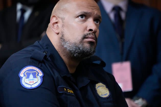 Harry Dunn, then a sergeant in the U.S. Capitol Police, listens as the House select committee investigating the Jan. 6 attack on the U.S. Capitol holds its final meeting on Dec. 19, 2022.