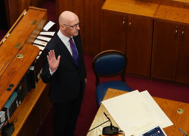 John Swinney takes the oath as he is sworn in as First Minister of Scotland and Keeper of the Scottish Seal, at the Court of Session in Edinburgh