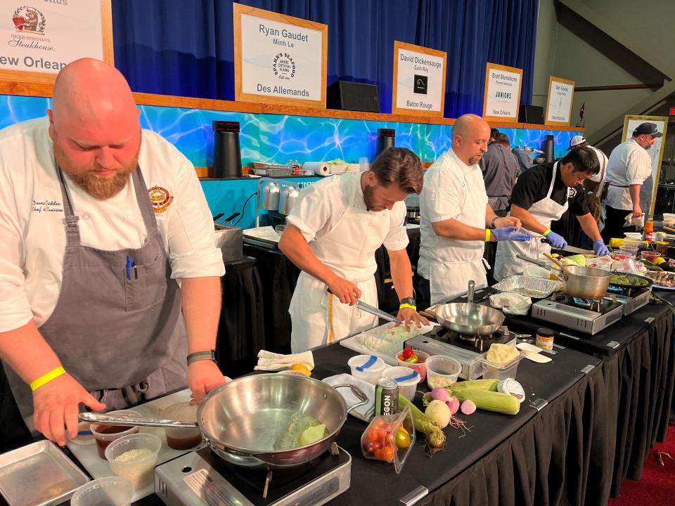 Chefs prepare their dishes for judges at Louisiana's 2022 15th annual Seafood Cook-Off in Lafayette.