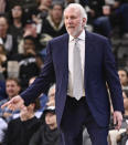 San Antonio Spurs coach Gregg Popovich reacts to a call from a referee during the second half of the team's NBA basketball game against the New York Knicks, Friday, March 15, 2019, in San Antonio. San Antonio won 109-83. (AP Photo/Darren Abate)