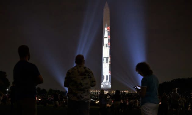 A Saturn V rocket is projected on the Washington Monument during a 17-minute multimedia presentation in the nation’s capital celebrating the 50th anniversary of the Apollo 11 moon landing. (NASA Photo / Bill Ingalls)