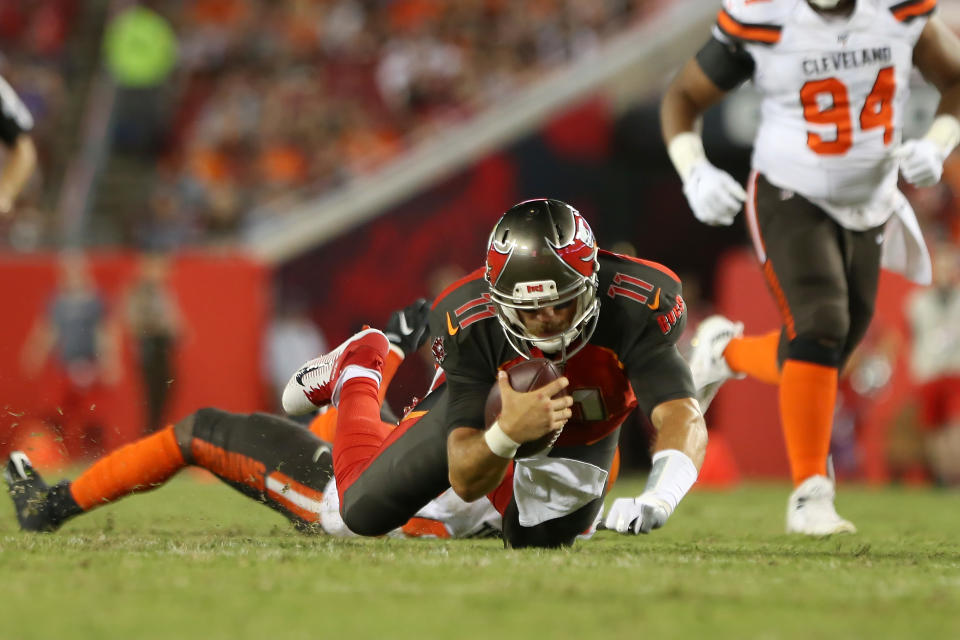 TAMPA, FL - AUG 23: Blaine Gabbert (11) of the Bucs goes down and injures his shoulder on this run during the preseason game between the Cleveland Browns and the Tampa Bay Buccaneers on August 23, 2019 at Raymond James Stadium in Tampa, Florida. (Photo by Cliff Welch/Icon Sportswire via Getty Images)
