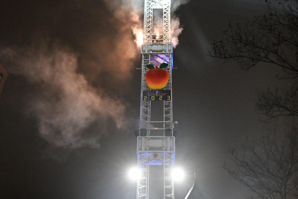 The Peach Drop celebration marks the new year in Atlanta on Jan. 1, 2023. <a href="https://www.gettyimages.com/detail/news-photo/general-view-of-the-peach-drop-during-the-peach-drop-2023-news-photo/1453573488" rel="nofollow noopener" target="_blank" data-ylk="slk:Paras Griffin/Getty Images;elm:context_link;itc:0;sec:content-canvas" class="link ">Paras Griffin/Getty Images</a>