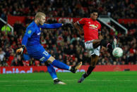 Soccer Football - Carabao Cup Third Round - Manchester United vs Burton Albion - Old Trafford, Manchester, Britain - September 20, 2017 Burton Albion's Connor Ripley clears from Manchester United's Marcus Rashford Action Images via Reuters/Jason Cairnduff