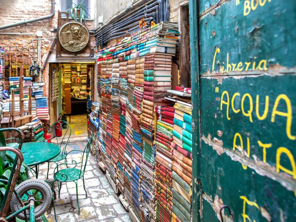 Books line the walls of Venice's "Libreria Acqua Alta."