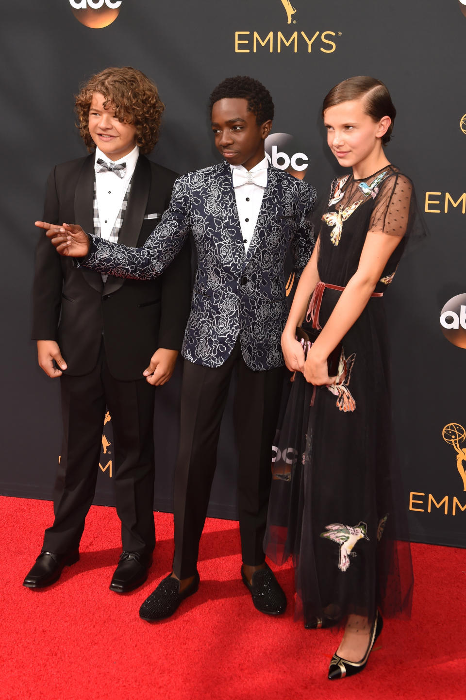 LOS ANGELES, CA - SEPTEMBER 18:  (L-R) Actors Gaten Matarazzo, Caleb McLaughlin, and Millie Bobby Brown attend the 68th Annual Primetime Emmy Awards at Microsoft Theater on September 18, 2016 in Los Angeles, California.  (Photo by Jeff Kravitz/FilmMagic)