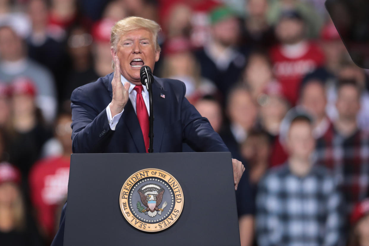 BATTLE CREEK, MICHIGAN - DECEMBER 18: President Donald Trump addresses his impeachment during a Merry Christmas Rally at the Kellogg Arena on December 18, 2019 in Battle Creek, Michigan. While Trump spoke at the rally the House of Representatives voted to impeach the president, making Trump just the third president in U.S. history to be impeached.  (Photo by Scott Olson/Getty Images)