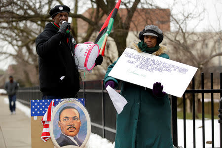 A protester stands outside the Leighton Criminal Courts Building during the sentencing of former Chicago police officer Jason Van Dyke in Chicago, Illinois, U.S., January 18, 2019. REUTERS/Joshua Lott