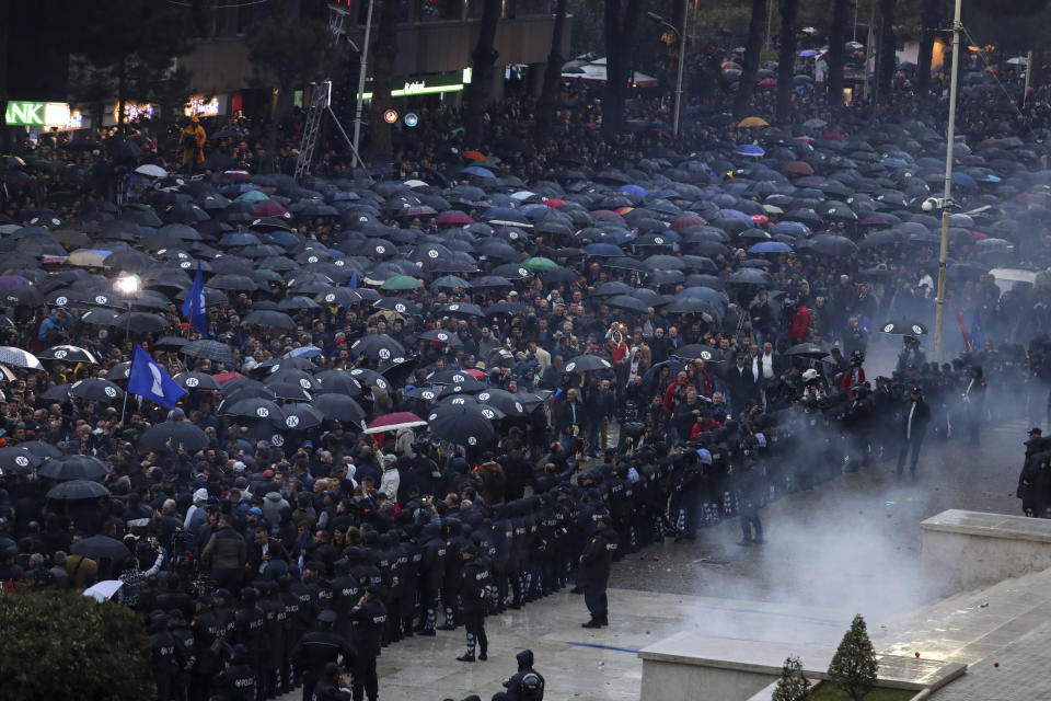 Protesters take part in an anti-government rally in Tirana, Albania, Saturday, April 13, 2019. Albanian opposition parties have gathered supporters calling for the government's resignation and an early parliamentary election. (AP Photo/Hektor Pustina)