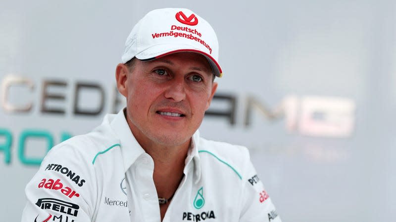 Michael Schumacher addresses reporters as he announces his retirement ahead of the 2012 Japanese Grand Prix on October 4, 2012.