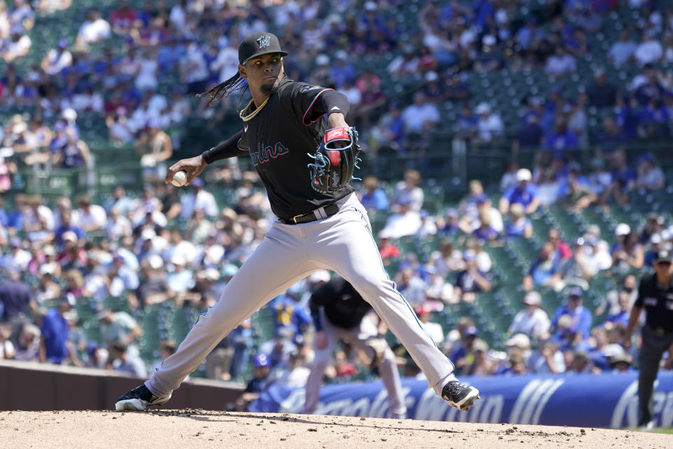 Miami Marlins starting pitcher Edward Cabrera winds up during the first inning of a baseball game against the Chicago Cubs Friday, Aug. 5, 2022, in Chicago. (AP Photo/Charles Rex Arbogast)
