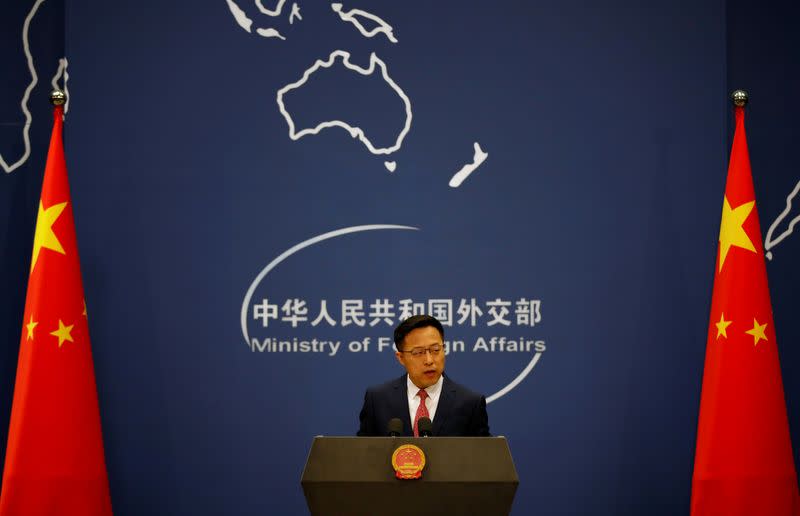 FILE PHOTO: Chinese Foreign Ministry spokesman Zhao Lijian attends a news conference in Beijing