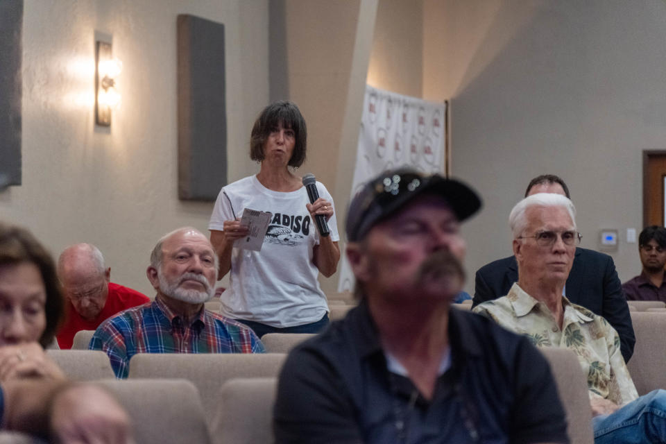 A member of the audience addresses Rep. Ronny Jackson a town hall Tuesday at the Arena of Church in Amarillo.