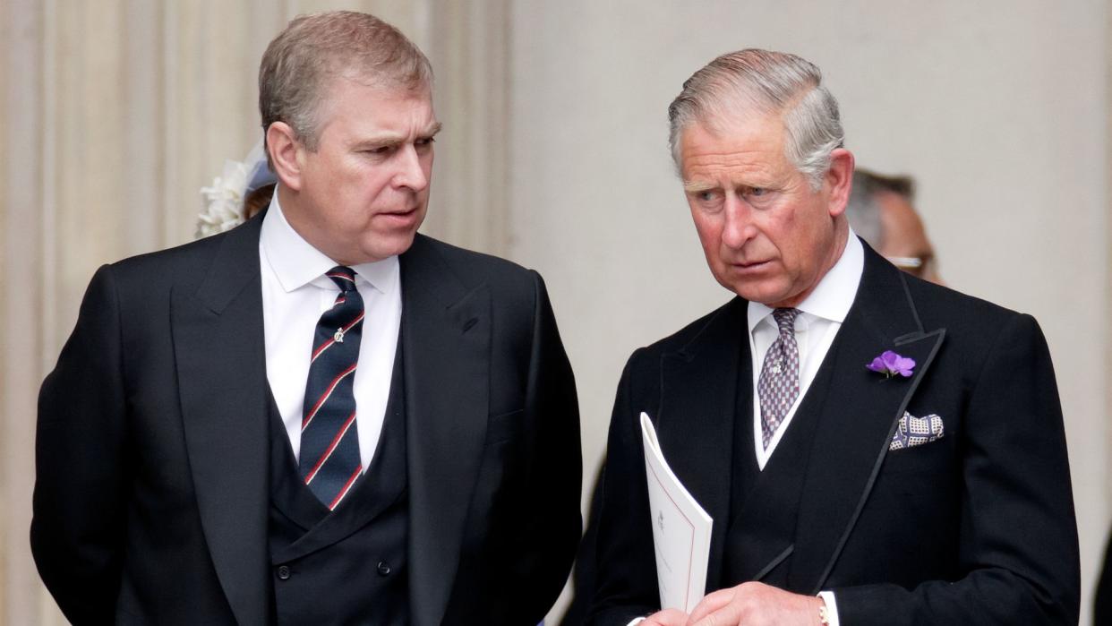 King Charles and Prince Andrew talking