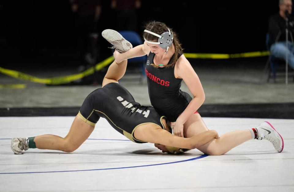 Bella Vista’s Gianna DiBenedetto and Natalin Hout of Chavez wrestle in the 140-pound title match during the Sac-Joaquin Section Masters Wrestling Championships at Stockton Arena in Stockton, Calif., Saturday, Feb. 17, 2024. DiBenedetto pinned Hout for the victory.