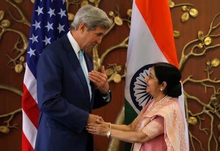 U.S. Secretary of State John Kerry (L) shakes hands with India's Foreign Minister Sushma Swaraj before the start of their meeting in New Delhi, India, August 30, 2016. REUTERS/Adnan Abidi