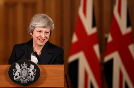 Britain's Prime Minister Theresa May smiles during a news conference at Downing Street in London, Britain November 15, 2018. Matt Dunham/Pool via Reuters