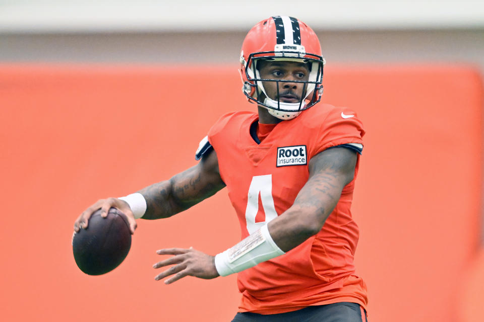 Cleveland Browns quarterback Deshaun Watson looks to pass during an NFL football practice at the team's training facility Wednesday, Nov. 30, 2022, in Berea, Ohio. (AP Photo/David Richard)