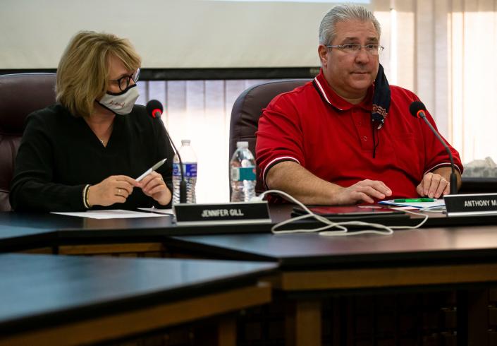 District 186 School board president Anthony Mares, right, along with Superintendent Jennifer Gill, left, convenes a special meeting of the Springfield School District 186 Board of Education at the District 186 Headquarters in Springfield, Ill., Monday, November 22, 2021. [Justin L. Fowler/The State Journal-Register] 