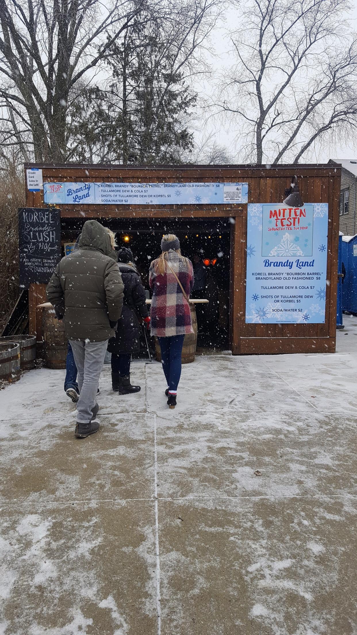 People wait in line to order drinks at Mitten Fest outside Burnhearts, 2599 S. Logan Ave., in Milwaukee's Bay View neighborhood on Feb. 3, 2018.