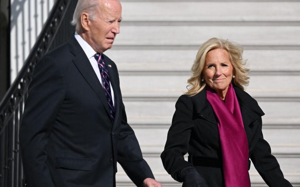 US President Joe Biden and First Lady Jill Biden make their way to board Marine One