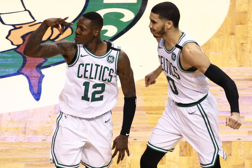 Terry Rozier (left) and rookie Jayson Tatum will have to pick up the offensive slack for the Celtics to challenge the 76ers’ defense. (Getty)