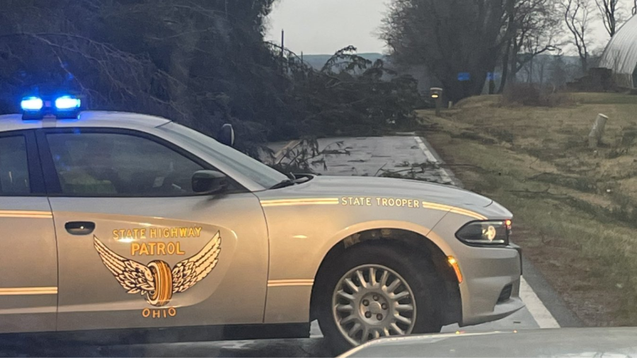 An Ohio State Highway Patrol cruiser blocks a roadway in Granville, Ohio that has multiple trees on the road after a storm surge on February 28, 2024. (Courtesy Photo/AEP Ohio)