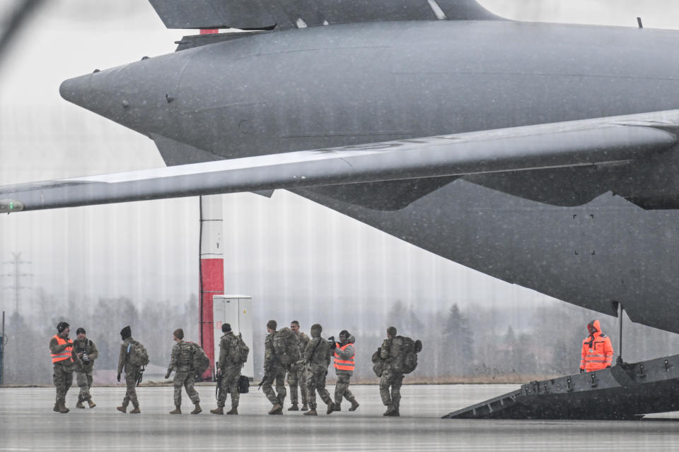 U.S. Army Soldiers exit a U.S. Air Force Boeing C-17A Globemaster III transport aircraft at Jasionka Rzeszow Airport on February 6, 2022, in Rzeszow, Poland. / Credit: Omar Marques/Getty
