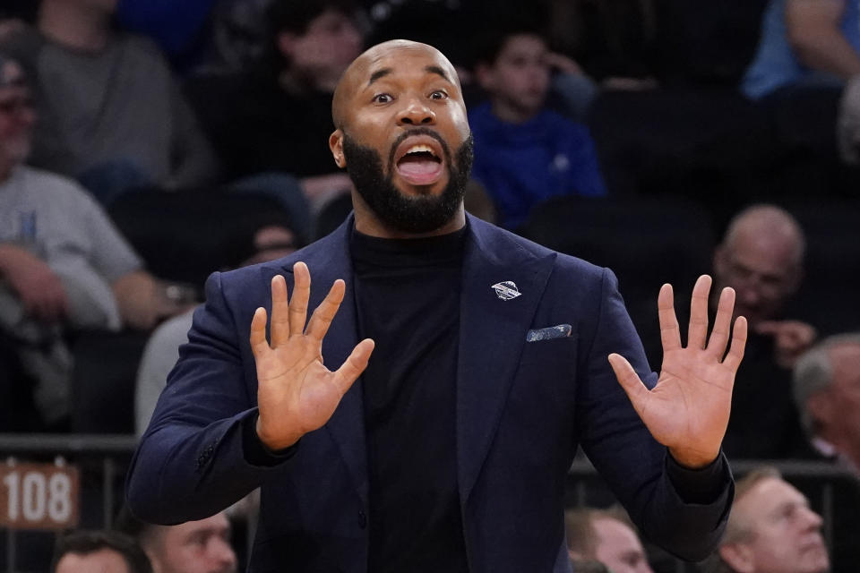 Villanova head coach Kyle Neptune works the bench in the first half of an NCAA college basketball game against Creighton during the quarterfinals of the Big East conference tournament, Thursday, March 9, 2023, in New York. (AP Photo/John Minchillo)