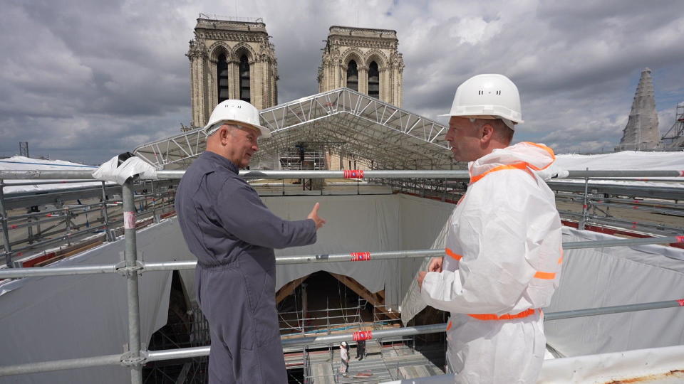 Gen. Jean-Louis Georgelin, who is overseeing the reconstruction of Notre Dame, with correspondent Seth Doane on the roof of the 12th century cathedral, which was damaged by fire in 2019. / Credit: CBS News